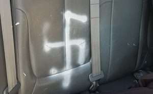 Swastika spray-painted on back seat of Kiley Swaine's car by Torrance Police Officers