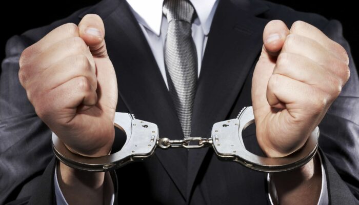handcuffed man