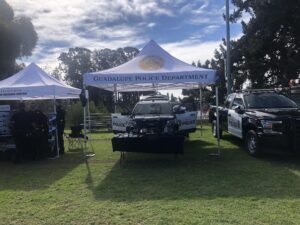 Guadalupe Police Department PR tent and cars