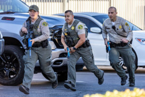 Los Angeles Sheriff's Department deputies with guns running
