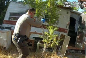 Kern County Sheriff's Deputy pointing gun