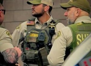 Riverside County Sheriff's Department deputy with full patrol vest on 2
