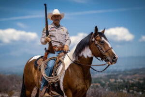 Chad Bianco on horseback