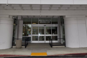 MLK Exodus Hospital entrance door w sign 2